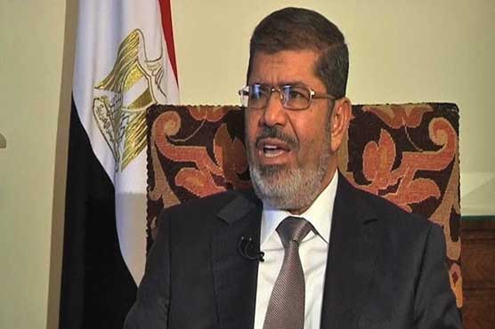 Morsi denounces cathedral violence, orders probe
