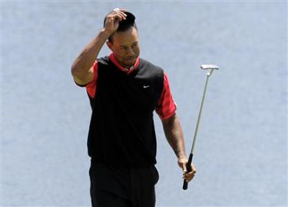 Woods wins at Bay Hill, reclaims world No. 1 ranking