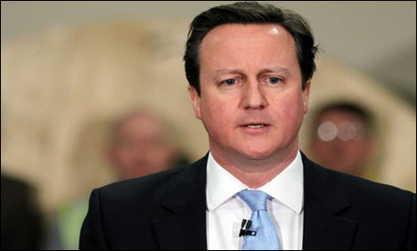 Cameron faces crisis after defeat