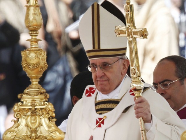 Pope vows to 'embrace poorest' at grand inauguration