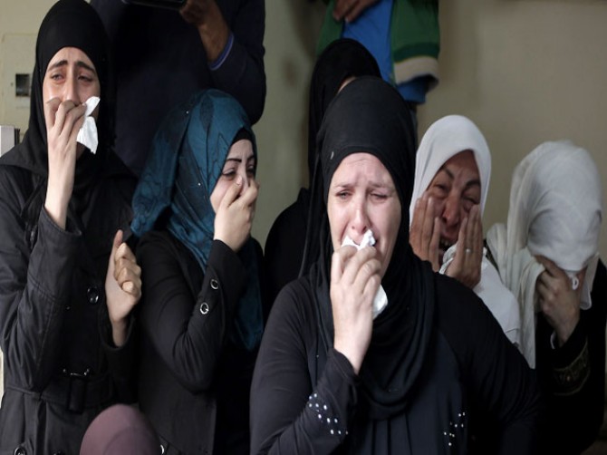 Anger as Palestinians bury prisoner, teens