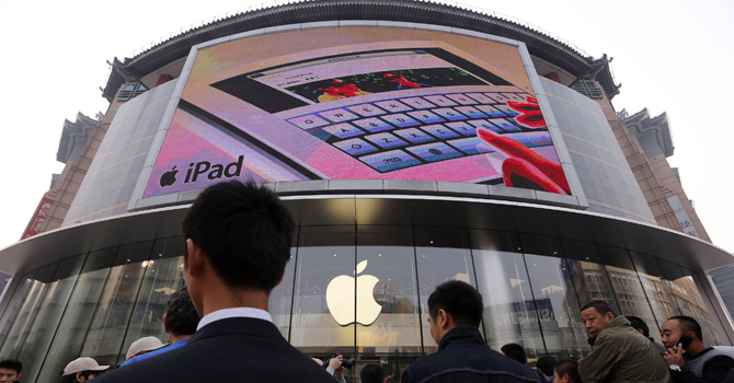  Appleâ€™s iPhone 5 starts strong in China but shares pressured