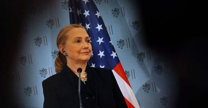 Clinton warns Russia, Iran of Syria conflict spreading