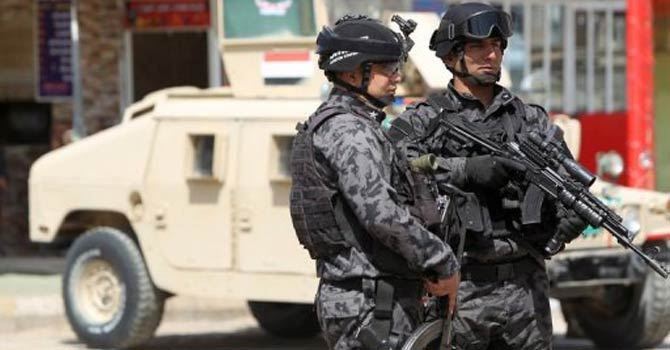 Attackers kill 12 in coordinated Baghdad assault