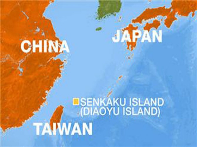 Japan warns China on islands landing