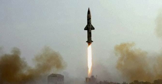 Iran test-fires missiles near Strait of Hormuz